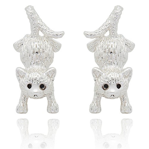 Silver cat earrings on a white background
